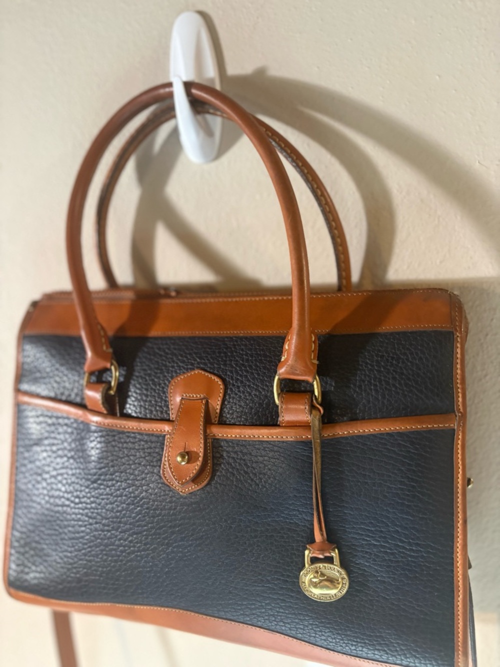 Dooney & Bourke Classic Black Leather Tote with Brass Accents Double Handles